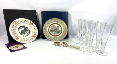 An assortment including table glassware, collectors plates, silver plated spoons and a napkin