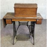 Singer sewing machine, with cast iron treadle