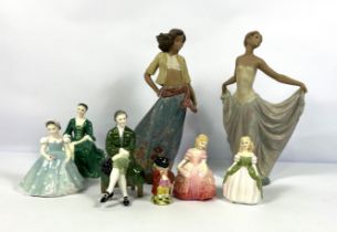 Two LLadro figures of dancing Spanish ladies, decorated in colours; also Royal Doulton figure `