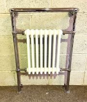 A modern chrome and cast iron radiator towel rail (purchased for home improvement but not