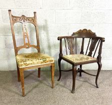 An Edwardian corner chair, with decorative inlays; an Arts and Crafts dining chair and four small