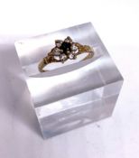 A small ‘sapphire” cluster ring, with paste white stones, 9 carat gold setting, size O, 1.5g (