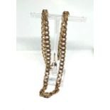 A 9 carat gold curb watch chain, 32g, marked 375, Italy and associated marks