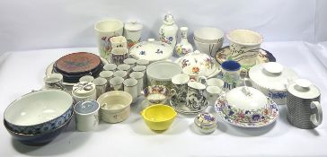 A large assortment of table ceramics, including a covered butter dish, decorated with flowers, a