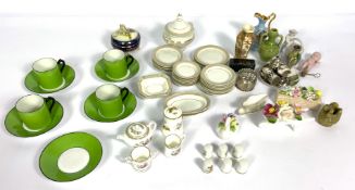 An assortment of ceramics, including a child's decorative miniature dinner service and tea