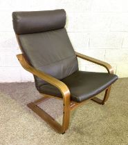 A modern leathered bentwood easy chair