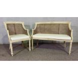 A Regency style painted and caned bergere canapé (settee) and matching armchair, each with a bowed