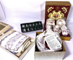 A boxed Royal Crown Derby bone china tea set, "Derby Posies" decorated with sprays of flowers;