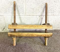 A vintage pine press, with turned wood screws and pine press blocks