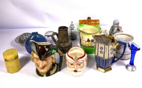 A selection of assorted decorative and novelty jugs and vases, including a Doulton character jug