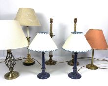 Seven assorted modern table lamps, including an unusual pair of bronzed candlestick lamp bases; a