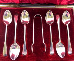 A set of late Victorian silver teaspoons, and a pair of sugar tongs, Sheffield, 1899, in a fitted