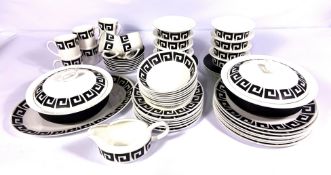 A stylish Wedgwood black and white bone china dinner service, decorated with Greek Key bands,