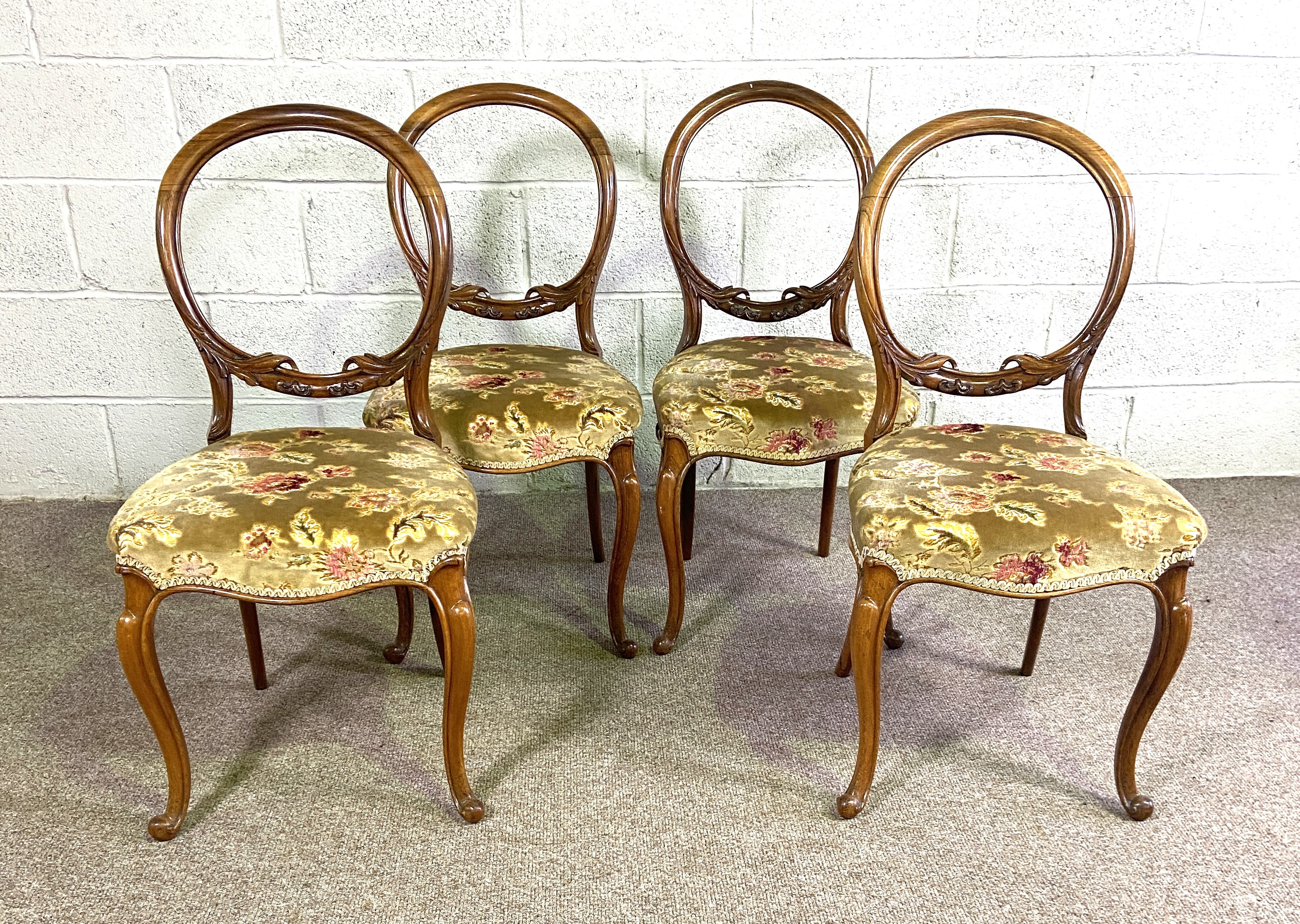 Four Victorian rosewood hoop-backed dining chairs, with cabriole legs (4)
