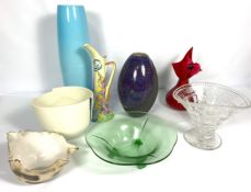 A group of assorted decorative glass and ceramic studio vases, including a tall ovoid purple blue