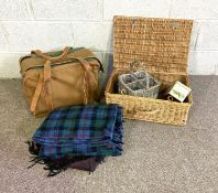 A wicker picnic hamper, wine carrier and useful canvas bag with multi section drinks compartments;