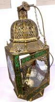 A large gilt metal Moroccan hall lantern, with pierced and decorative sides and domed top, 20th