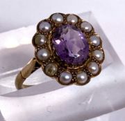 A vintage amethyst and pearl ring, yellow metal setting, marked 9ct, ring size Q, 4g (gross); also