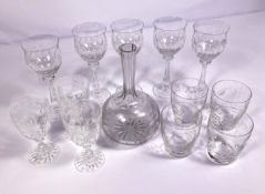 Assorted crystal glassware, including an etched glass decanter, a set of wine goblets and related (a