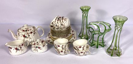 A Minton's bone china "Ancestral" six place tea service, decorated with flowers and gilt lined;