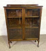 A vintage beechwood bookcase, with glazed doors, 48cm high
