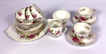 Three assorted part tea services, together with a small quantity of stoneware mugs etc (a lot)