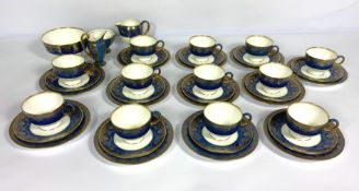 A selection of tea wares, including a Wedgwood 12 place tea service, with cups, saucers, and plates,