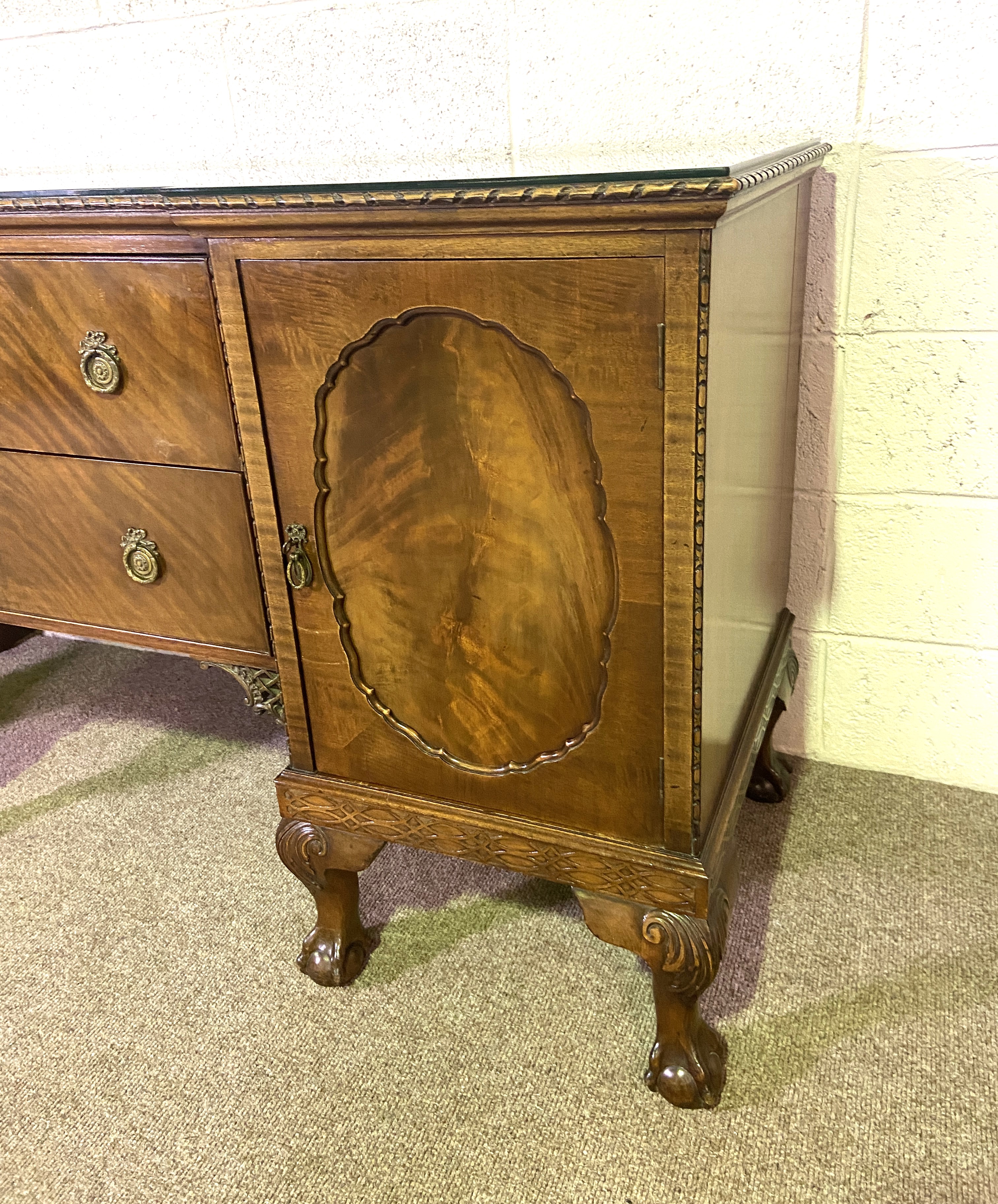 A George III style breakfront mahogany veneered sideboard, the plain top with a moulded edge, over - Image 2 of 4