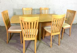 A good ash wood modernist dining suite, with a set of six designer dining chairs and a matching