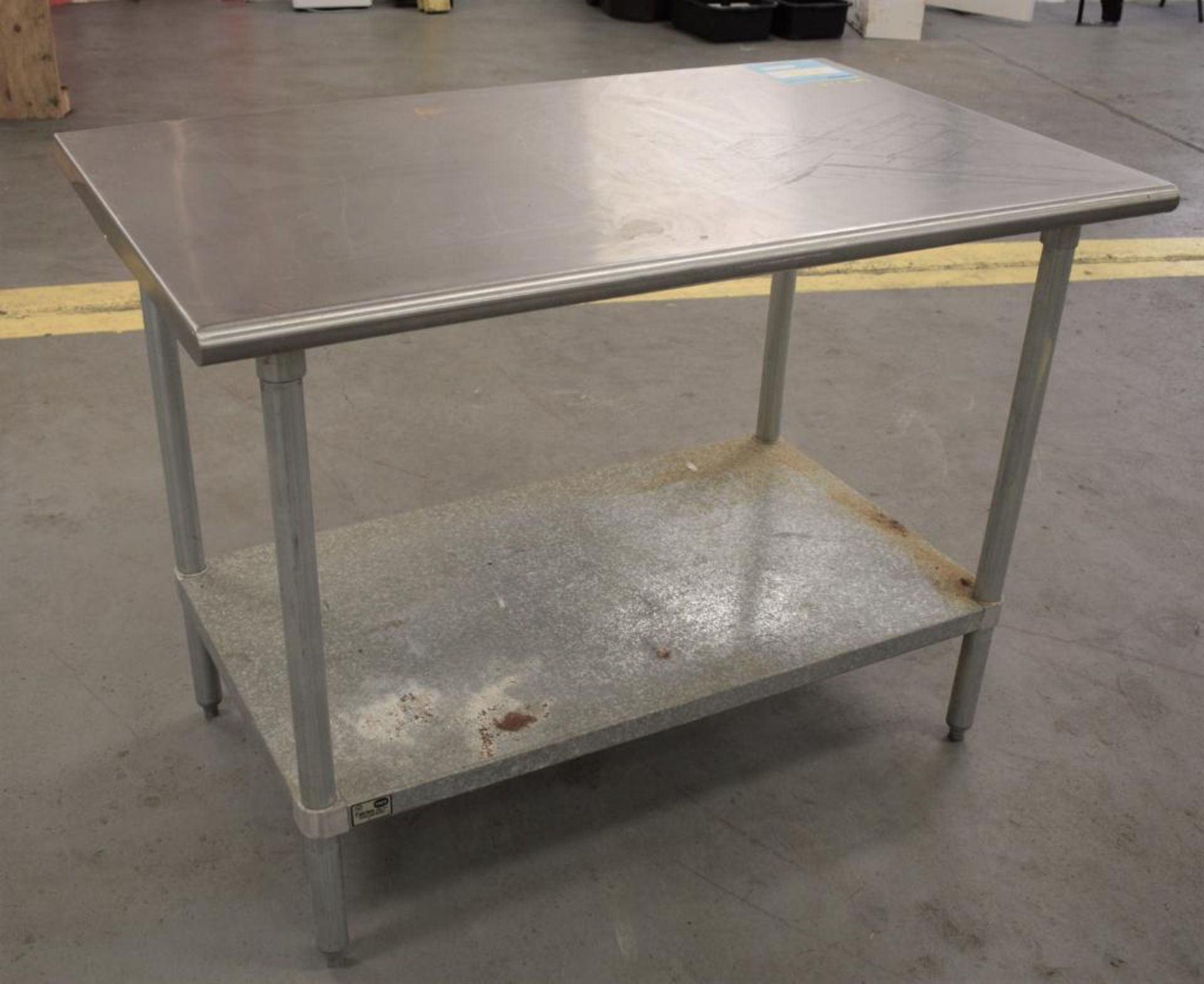 TABCO Stainless Steel Top Table. Approximate 30" wide x 48" long x 36" tall. With bottom shelf and ( - Image 3 of 5