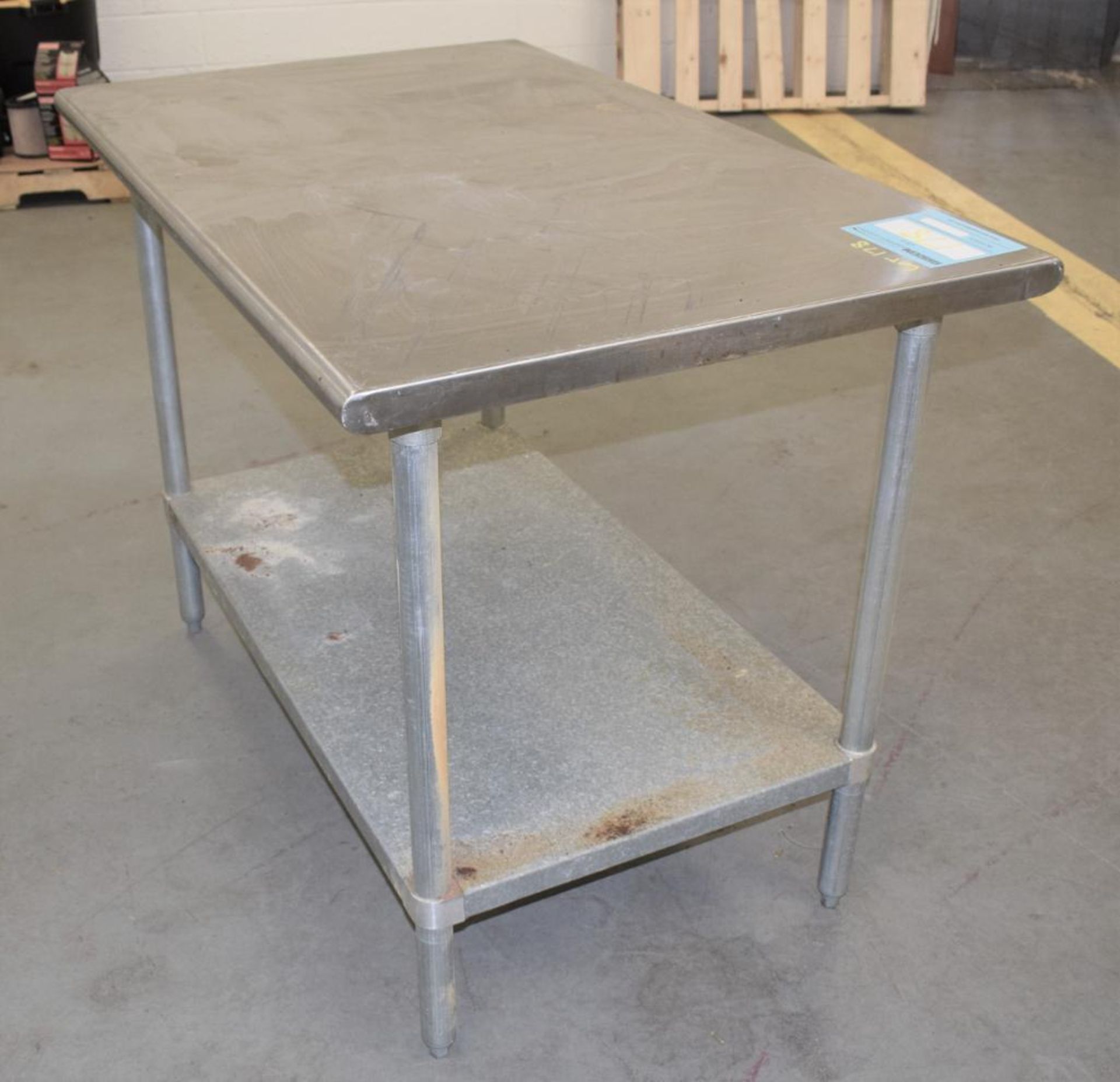 TABCO Stainless Steel Top Table. Approximate 30" wide x 48" long x 36" tall. With bottom shelf and ( - Image 2 of 5