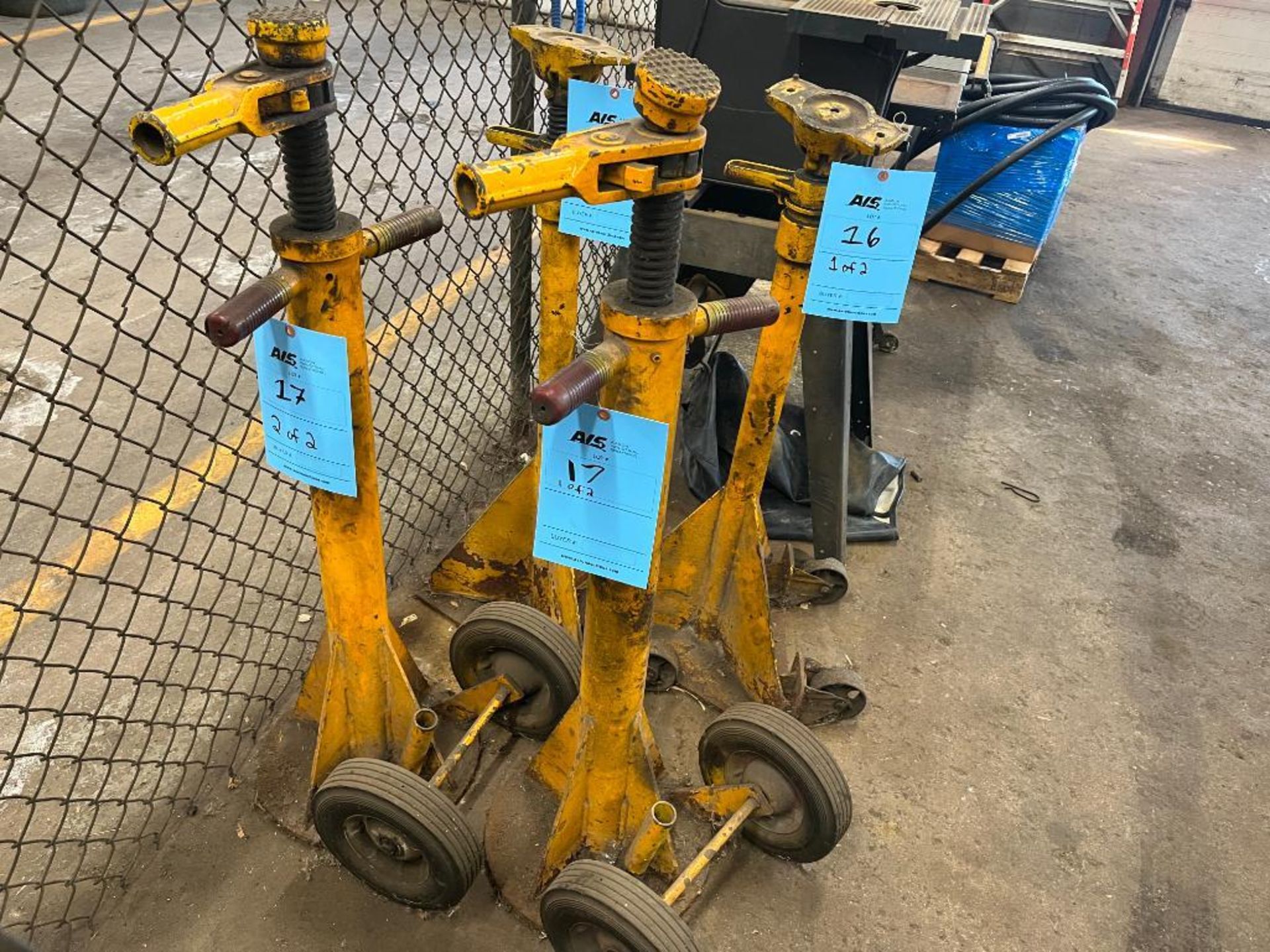 Lot of (2) automotive Jacks w/casters