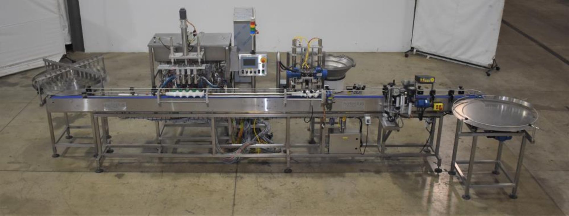 Used- Hefestus Bottling Line. 20-30 bottles per minute. Includes the following: New England Bulk Bot