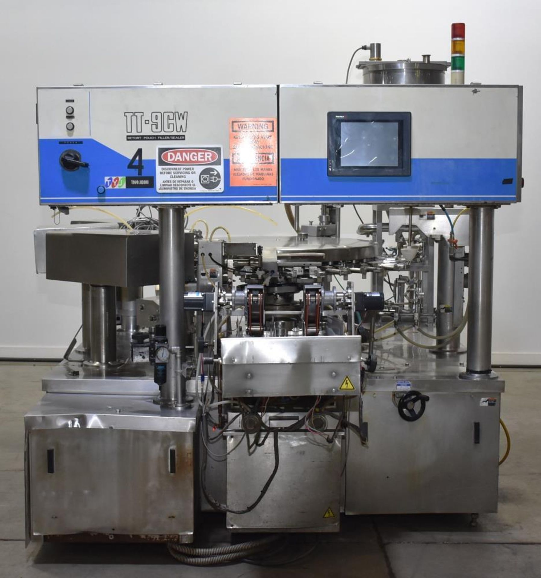 Used- Toyo Jidoki Horizontal Pre-Made Pouch Packager, Model TT9CW. Machine rated for speeds up to 10