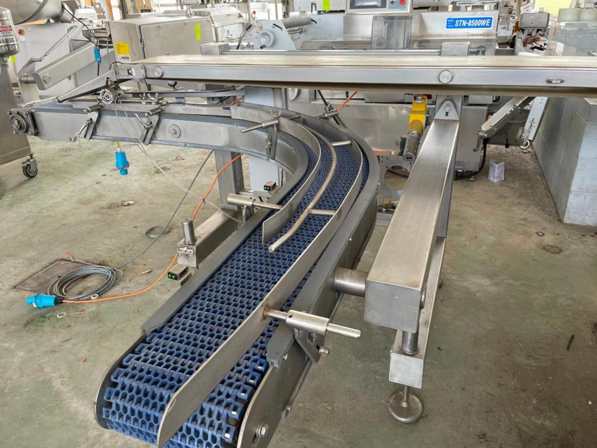 Traying conveyor, 80 degree turn, no tag, 92” white conveyor, 103 L, 65 X, 8.5” Wide belt. Designed - Image 2 of 6