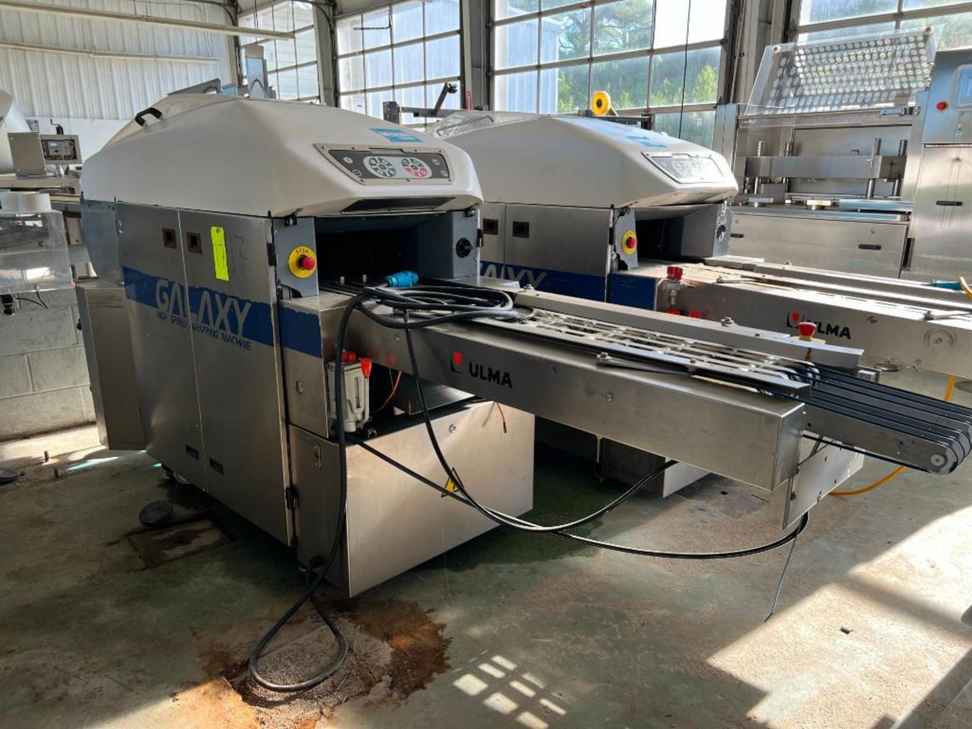 ULMA Galaxy high speed overwrap machine, sn: 2104705, 230V/3Ph/60hz, year: 2012. 134 L X 33 W X 62 H