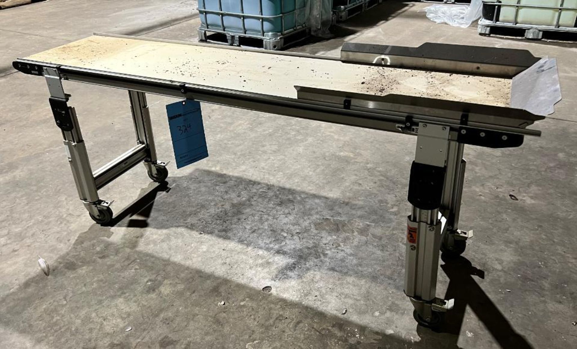 Dorner Rubber Belt Conveyor. Approximate 16" wide x 72" long belt, aluminum frame. Last used with LO