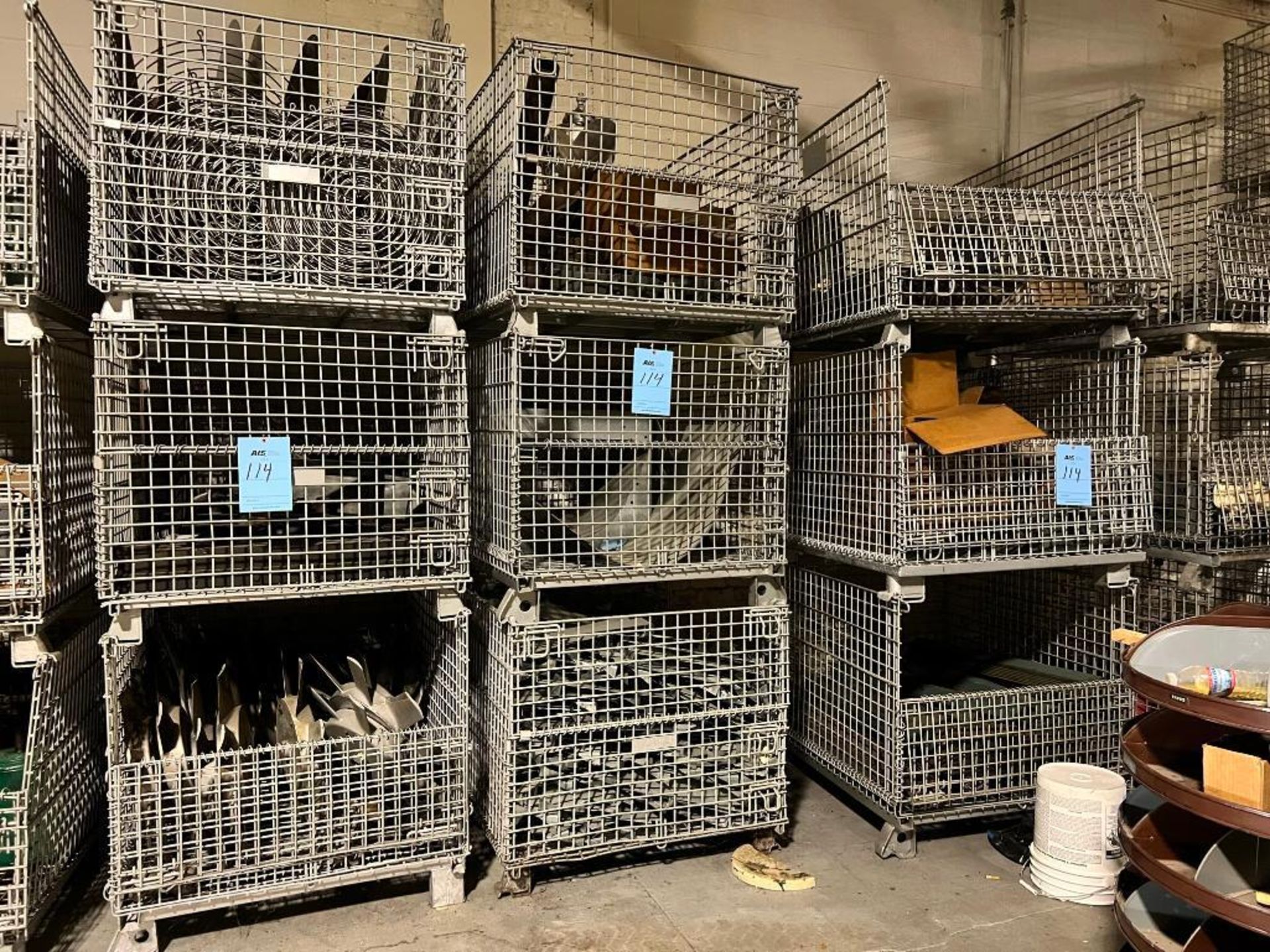 Lot: (9) Wire Baskets with Assorted Silencers, Ranes, & Dryer Parts
