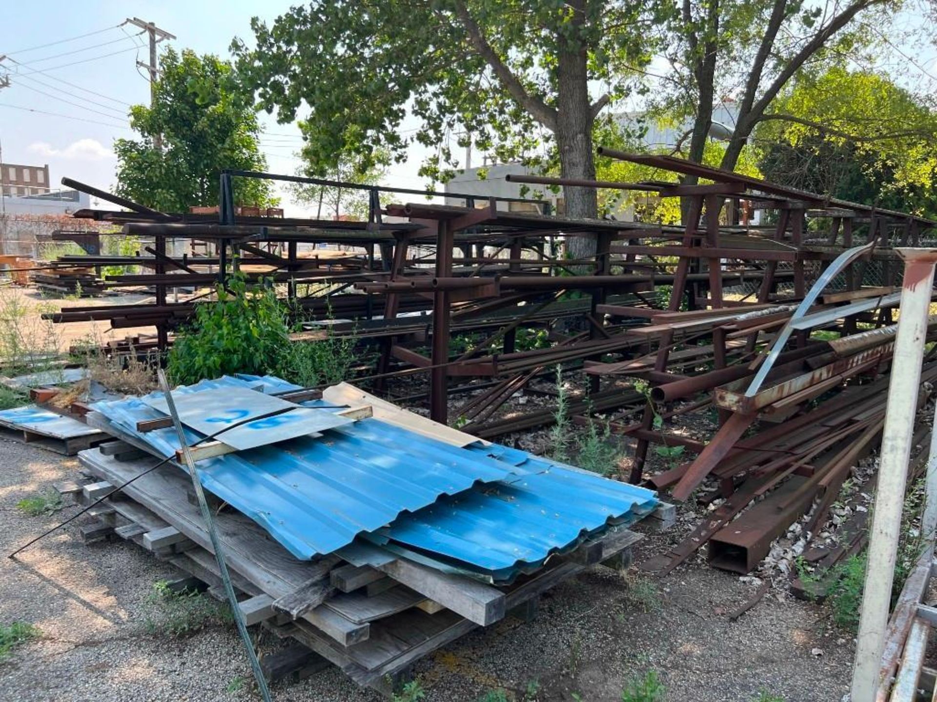 Contents of Rear Yard Including: Assorted Material Racks, Roller Conveyor, A-Frame Racks with Pipe & - Image 10 of 24