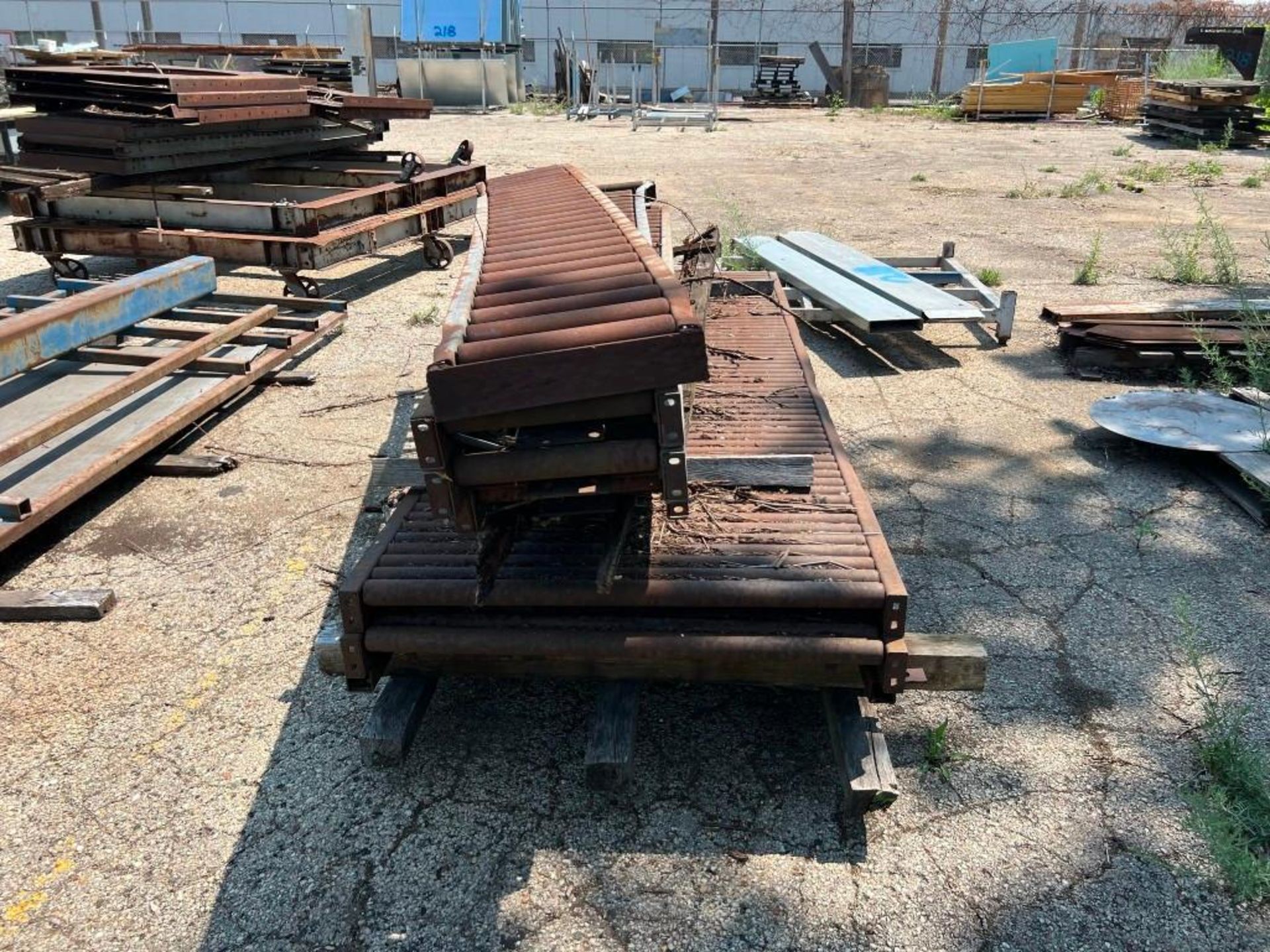 Contents of Rear Yard Including: Assorted Material Racks, Roller Conveyor, A-Frame Racks with Pipe & - Image 12 of 24