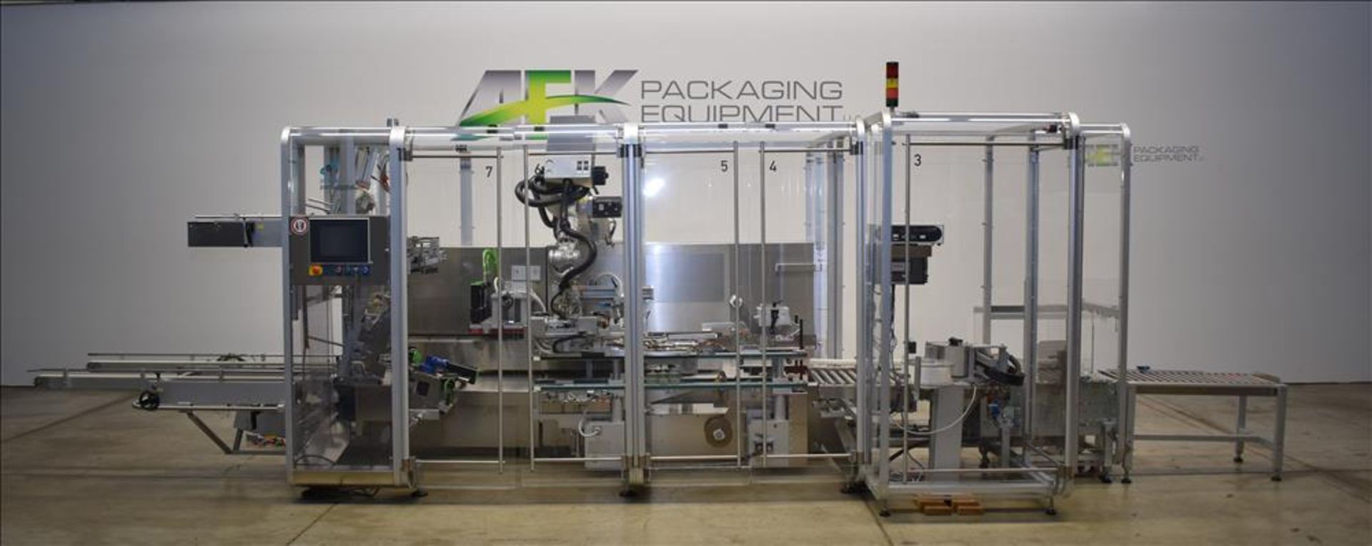 Used- Pester Model TLC-2 Automatic Top Load Robotic Case Packer. Pharma spec. Capable of speeds up t