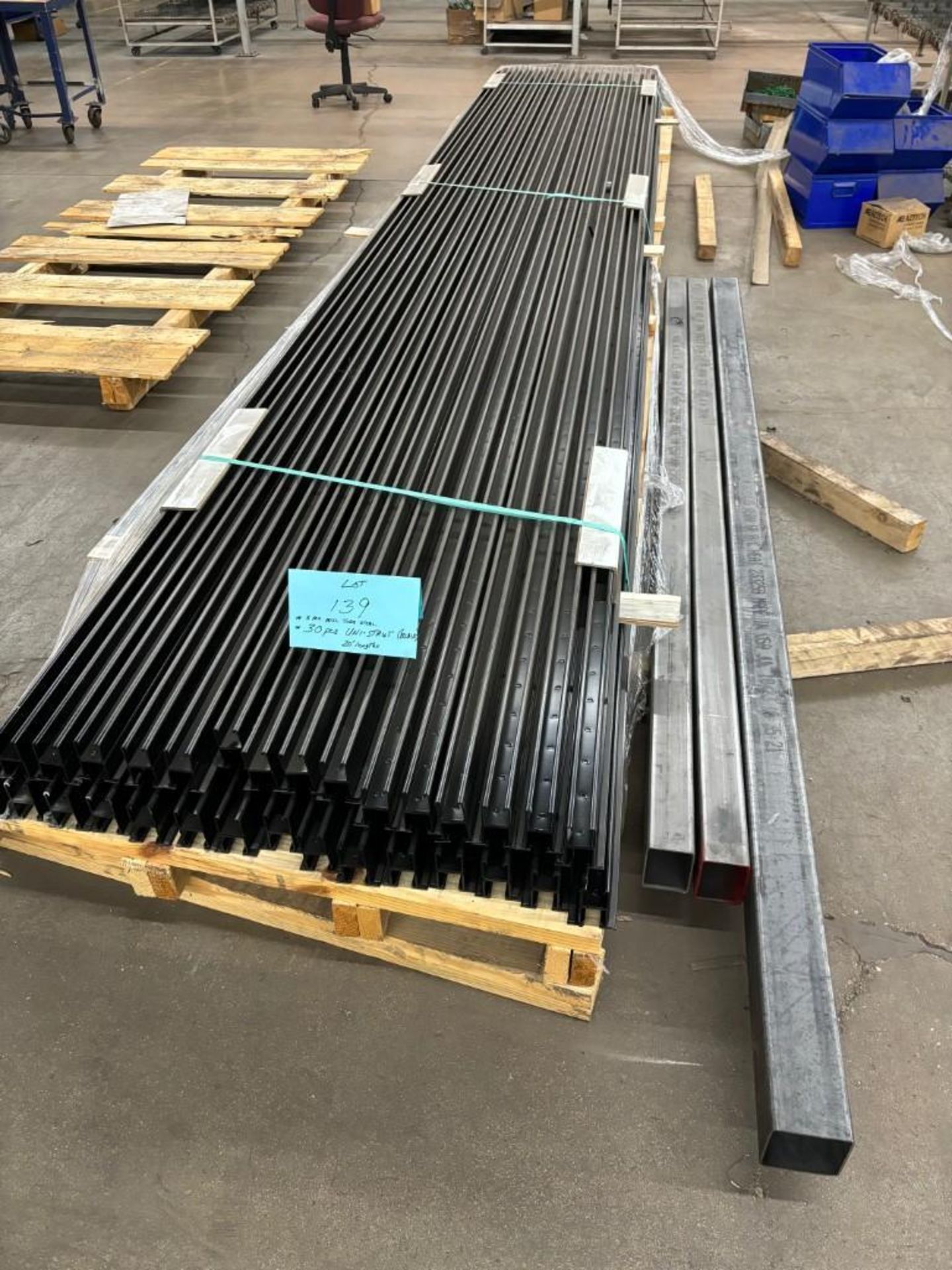 LOT: (30) pieces Uni-Strut black tube, 20' length, and (3) pieces misc. tube steel
