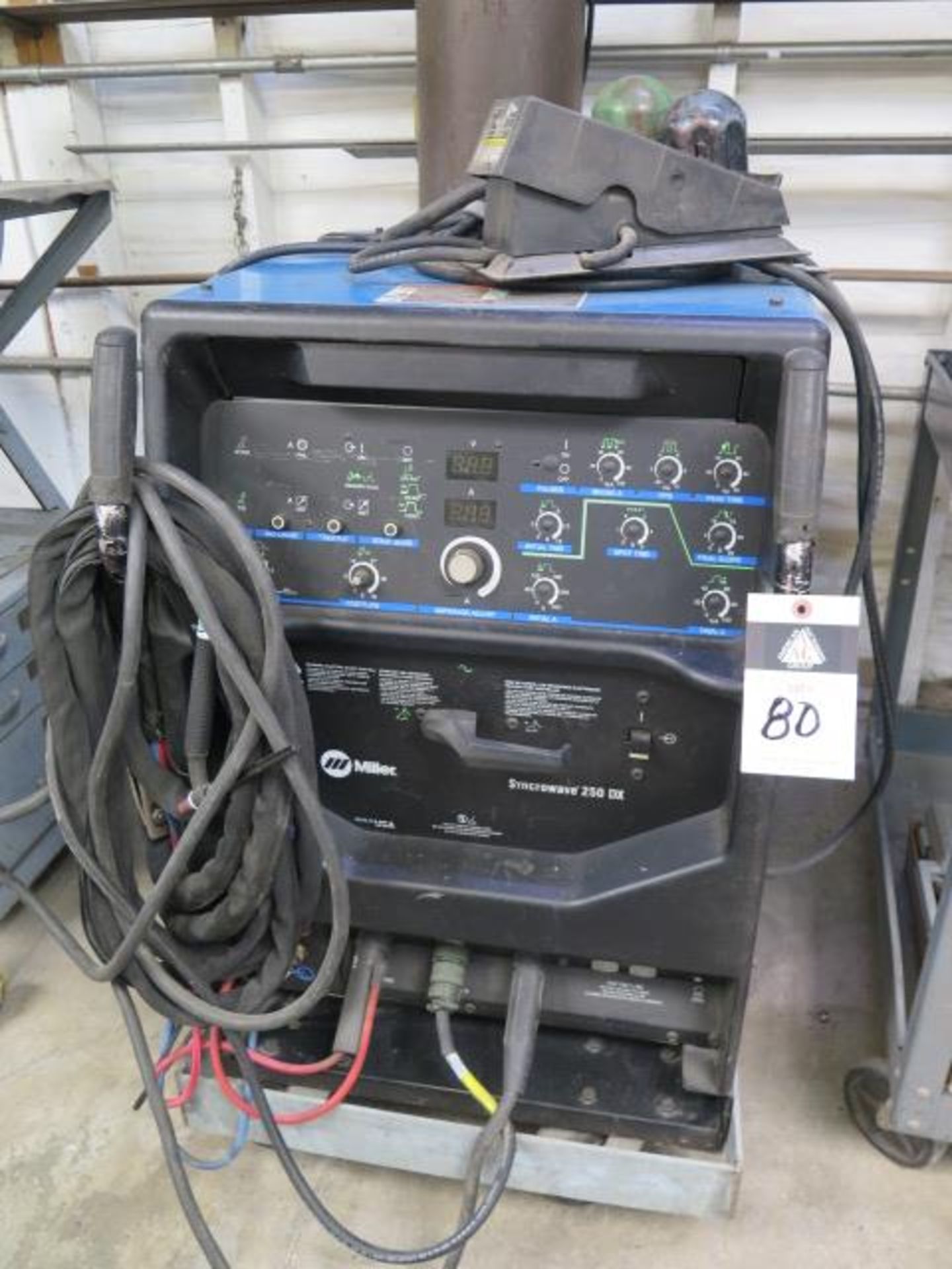 Miller Syncrowave 250DX TIG Welding Source s/n LF400159L w/ Built-In Cooler and Cart, SOLD AS IS