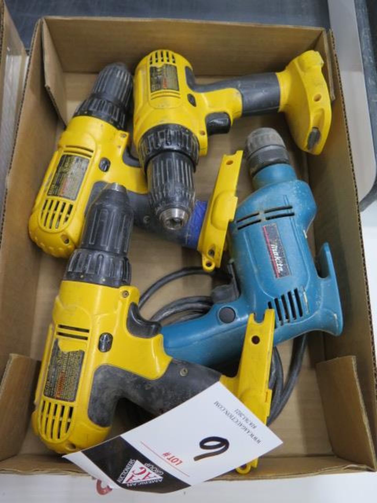 DeWalt 14.4Volt Cordless Drills (3) (NO CHARGER OR BARRERIES) and Makita Electric Drill (SOLD AS-