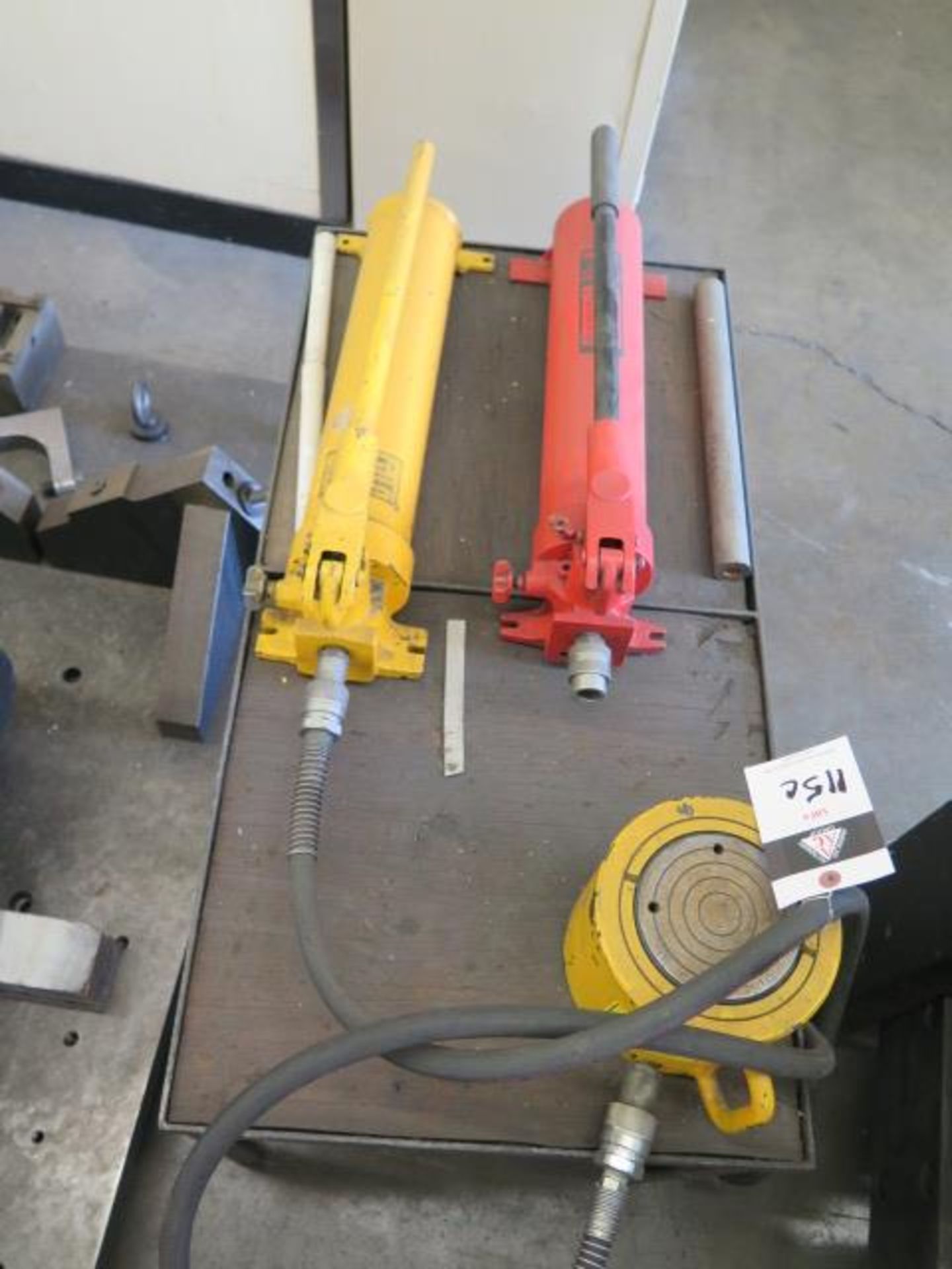 Hydraulic Jacks (2) and Ram (SOLD AS-IS - NO WARRANTY)