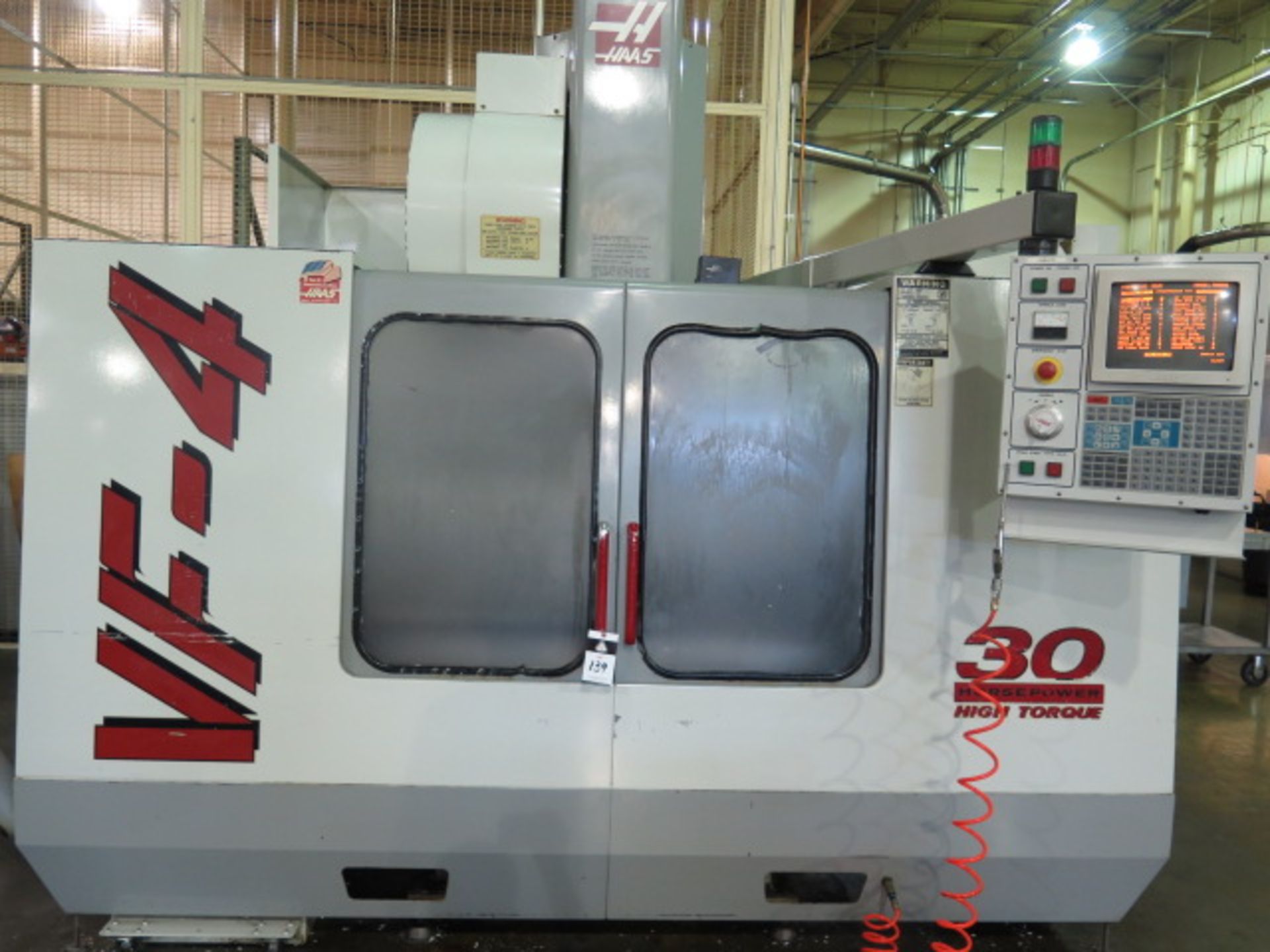 1999 Haas VF-4 CNC VMC s/n 18376 w/ Haas Controls, 24-Station Side Mount,Cat 40, SOLD AS IS