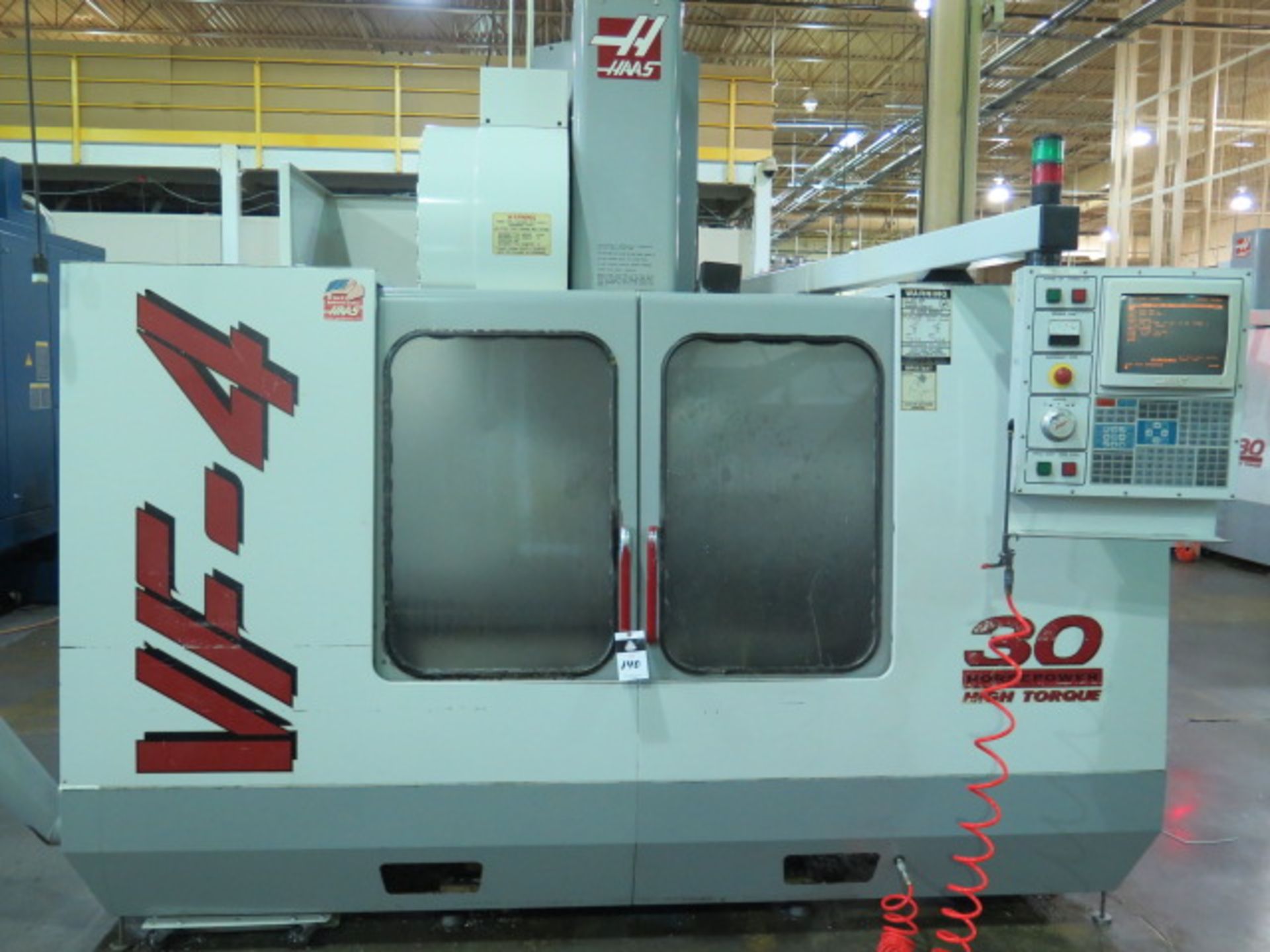 1999 Haas VF-4 CNC VMC s/n 18375 w/ Haas Controls, 24-Station Side Mount, Cat 40, SOLD AS IS