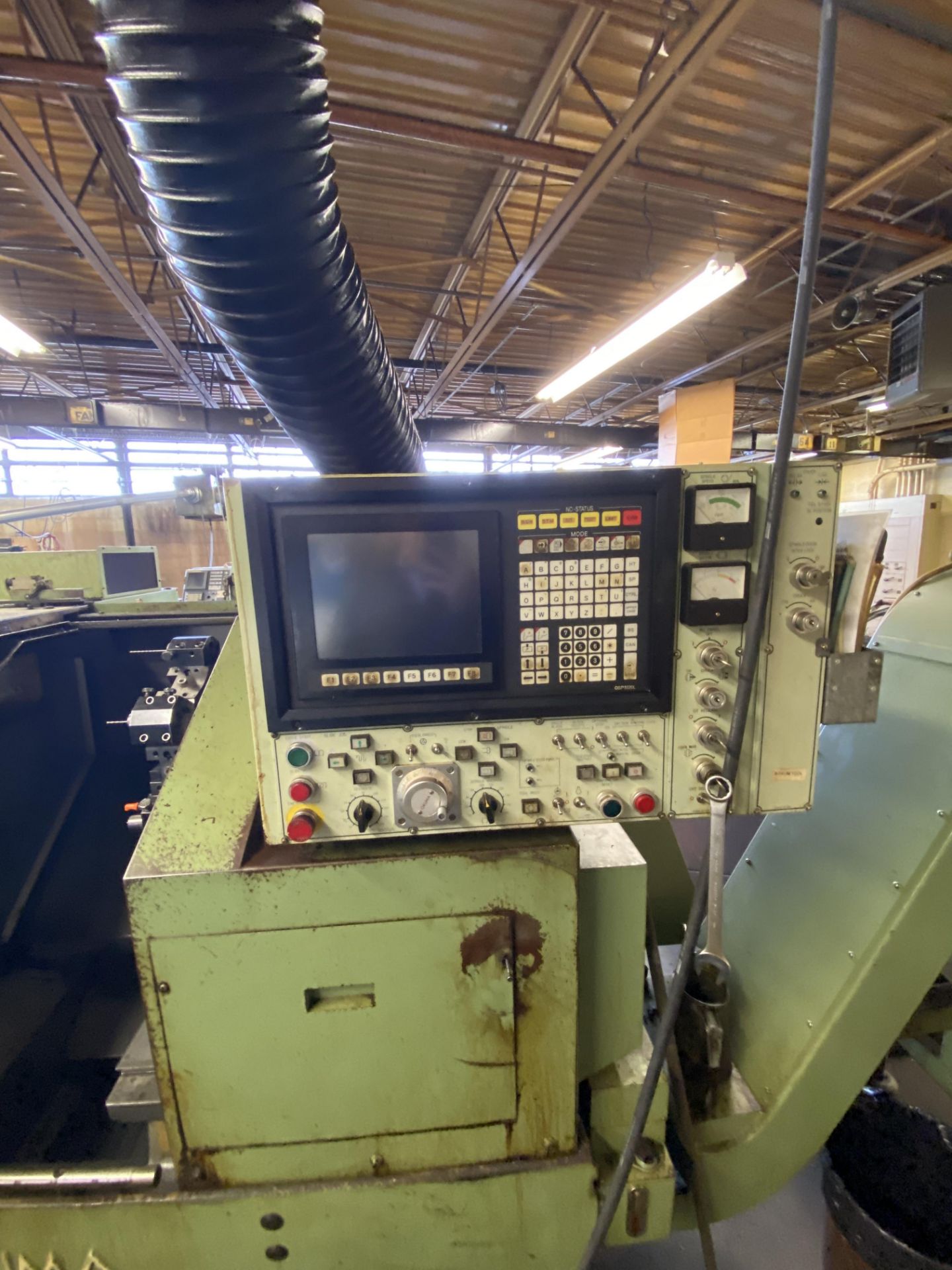 Okuma LB15 CNC Turning Center w/ Okuma Model OSP-5020L CNC controller, Enomoto EC27 Chip Conveyor - Image 8 of 9