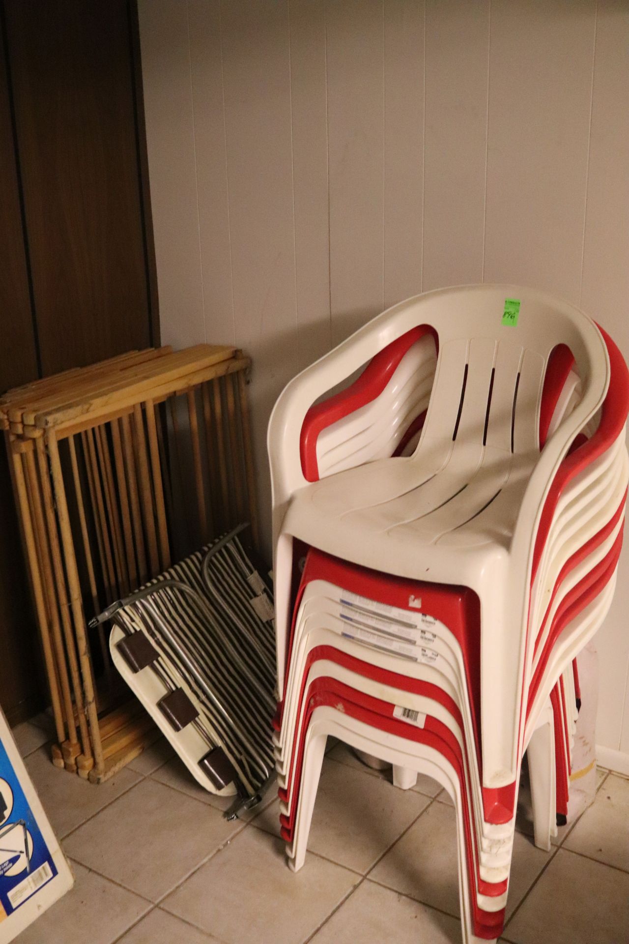 Group of stackable plastic chairs