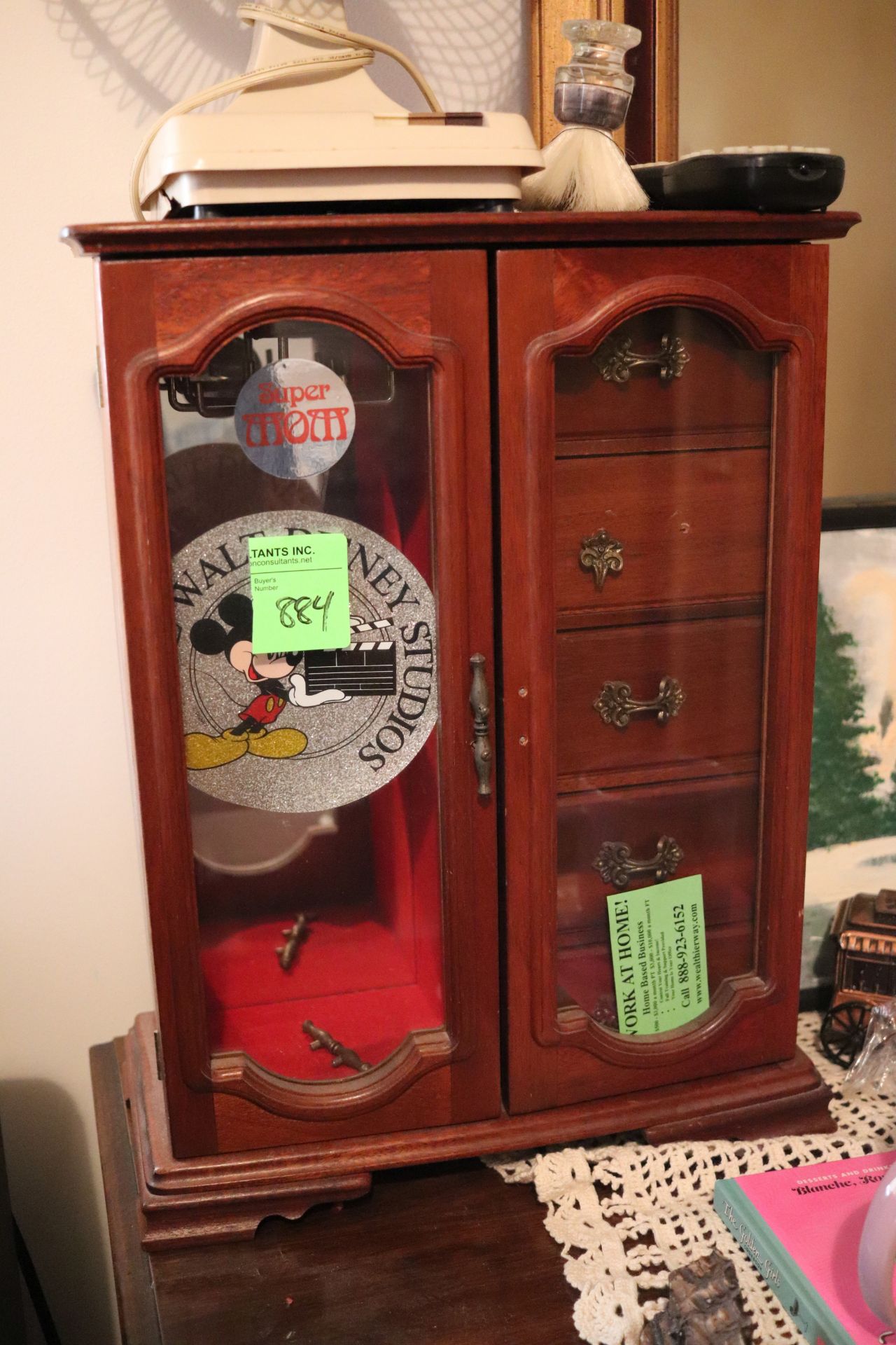 Jewelry cabinet with five drawers and two doors